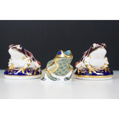 17 - Trio of Royal Crown Derby frogs to include a pair of Imari pattern examples, one with gold stopper a... 