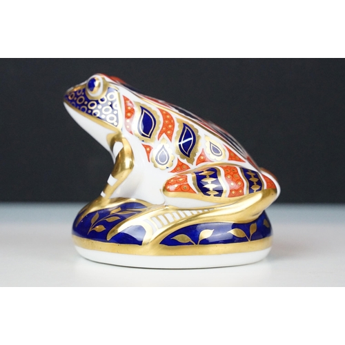 17 - Trio of Royal Crown Derby frogs to include a pair of Imari pattern examples, one with gold stopper a... 