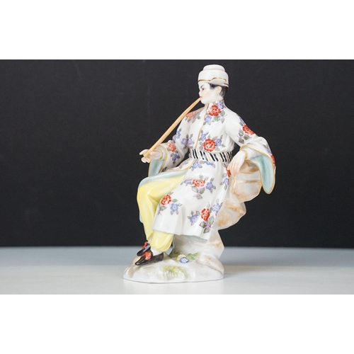 18 - Early 20th century Meissen figurine in the form of a Japanese man in floral robe with pipe, crossed ... 