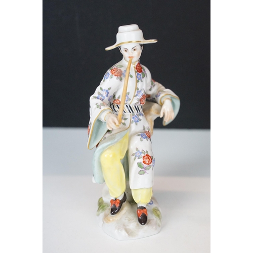 18 - Early 20th century Meissen figurine in the form of a Japanese man in floral robe with pipe, crossed ... 