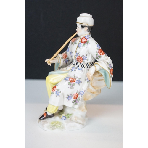 18 - Early 20th century Meissen figurine in the form of a Japanese man in floral robe with pipe, crossed ... 