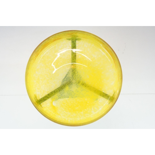 21 - Art Nouveau style large yellow marmorated glass bowl with a flat bottom resting on a wrought iron ba... 