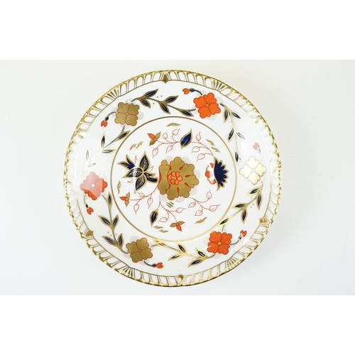 25 - Royal Crown Derby Imari A.962 soup cup and saucer together with a selection of plates to include Ima... 