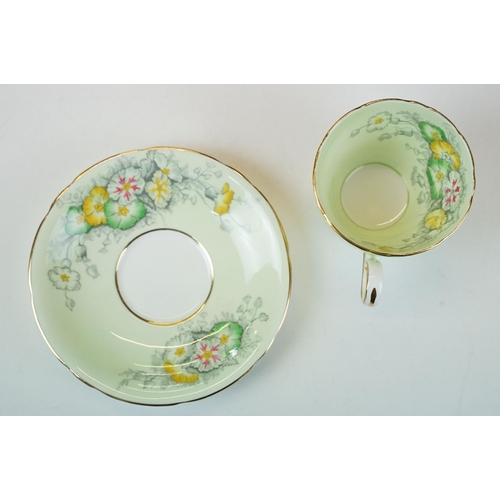 37 - Set of five Aynsley Dianthus on light green and gilt edge coffee cups and saucers together with lidd... 