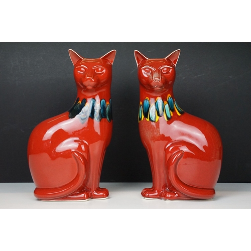 39 - Pair of Poole Pottery living glaze red cat figurines, H 30cm