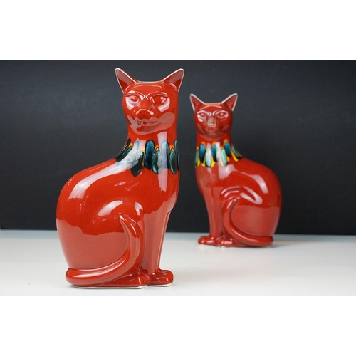 39 - Pair of Poole Pottery living glaze red cat figurines, H 30cm