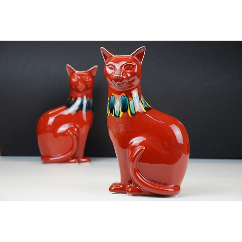 39 - Pair of Poole Pottery living glaze red cat figurines, H 30cm