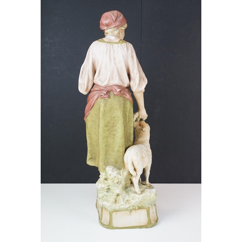 46 - Pair of early 20th century large Royal Dux ceramic figurines of a shepherdess and shepherd with lamb... 