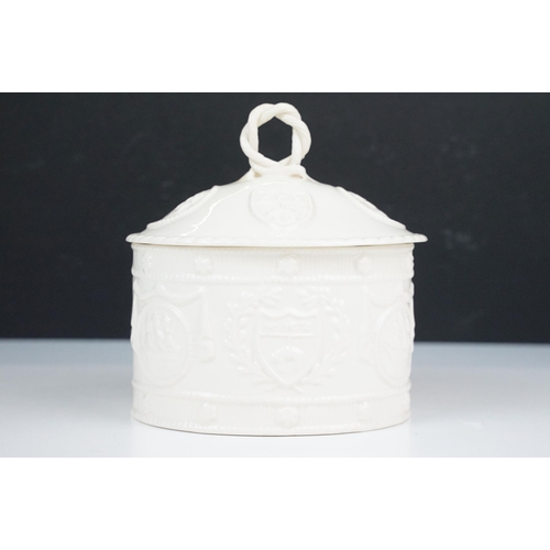 48 - Leedsware creamware embossed lidded pot with heraldry design and twisted handle, stamped to base, H ... 