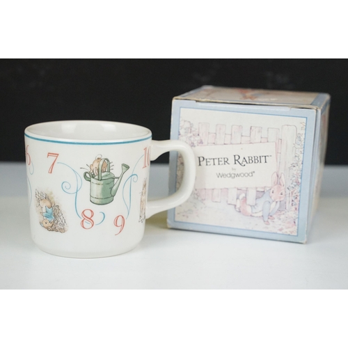 54 - Royal Doulton Bunnykins two piece cereal bowl and mug together with a money ball, Wedgwood Peter Rab... 