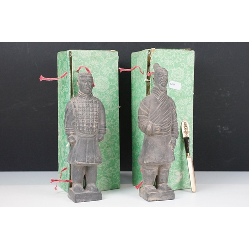 67 - Two Chinese terracotta warrior soldier figurines on square bases, H 20.5cm