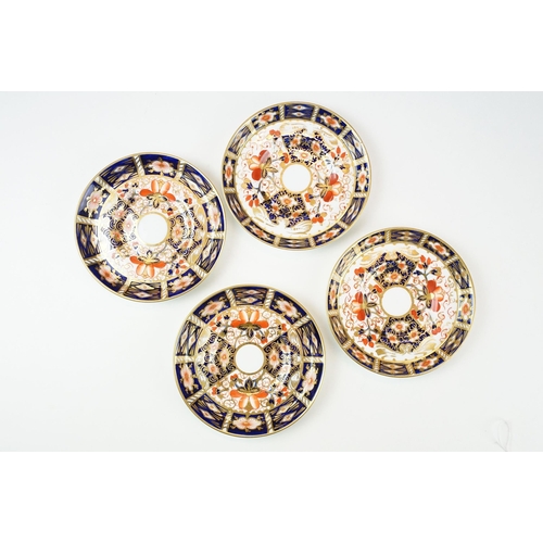 68 - Set of four Royal Crown Derby demitasse coffee cups and saucers in the traditional Imari pattern, 24... 