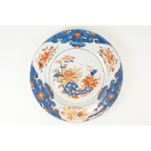 7 - 18th century porcelain octagonal plate polychrome decorated with flowers and trees on a plain white ... 