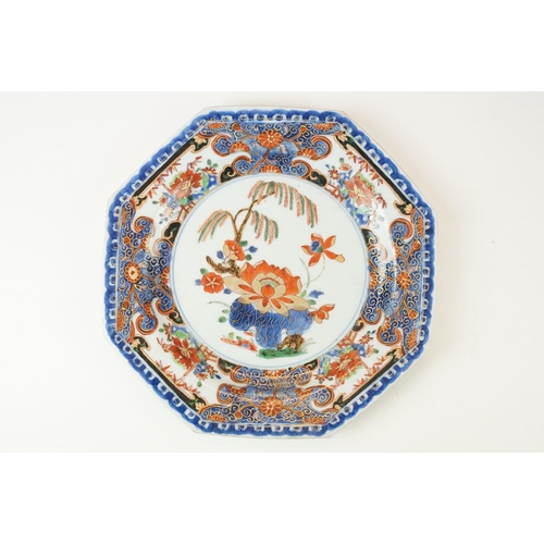 7 - 18th century porcelain octagonal plate polychrome decorated with flowers and trees on a plain white ... 