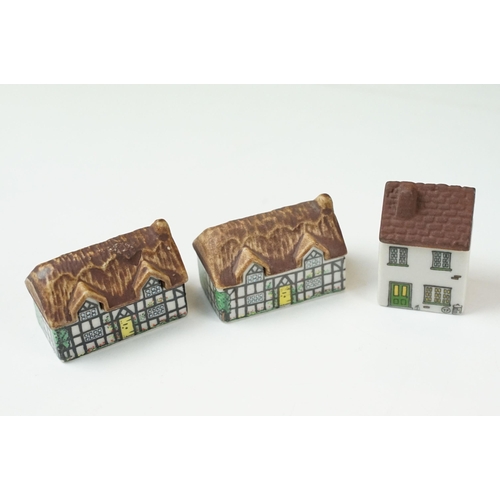 70 - Quantity of Wade Whimsey-on-Why miniature ceramic houses, to include Bloodshot Hall, Picture Palace,... 