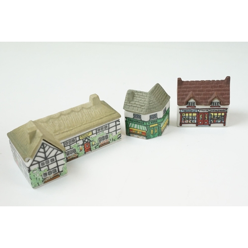 70 - Quantity of Wade Whimsey-on-Why miniature ceramic houses, to include Bloodshot Hall, Picture Palace,... 