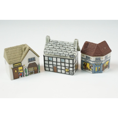 70 - Quantity of Wade Whimsey-on-Why miniature ceramic houses, to include Bloodshot Hall, Picture Palace,... 