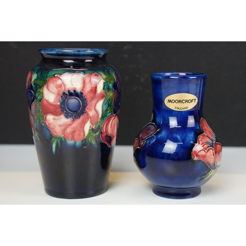 73 - Moorcroft pottery 'Anemone' small baluster vase, H 10.5cm and taller vase, H 13cm with sticker and s... 