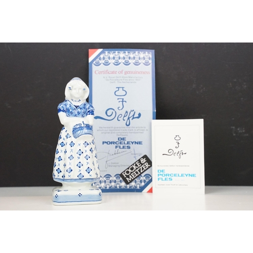 74 - Focke and Meltzer Delft ware lady with basket figurine 'De Porceleyne Fles', H 16cm