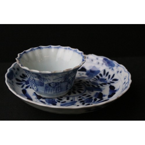 204A - Two Chinese blue and white pieces to include a round dish hand painted with florals and mountain sce... 