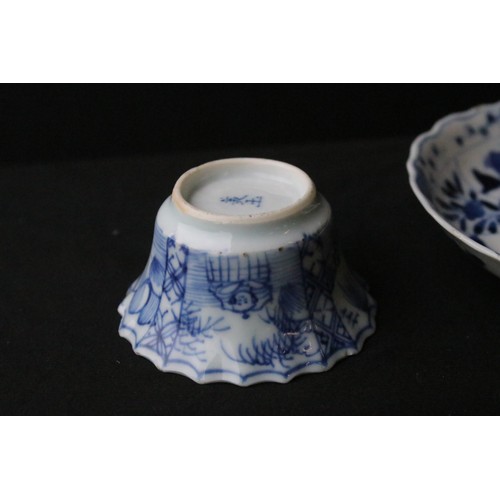 204A - Two Chinese blue and white pieces to include a round dish hand painted with florals and mountain sce... 