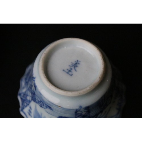 204A - Two Chinese blue and white pieces to include a round dish hand painted with florals and mountain sce... 