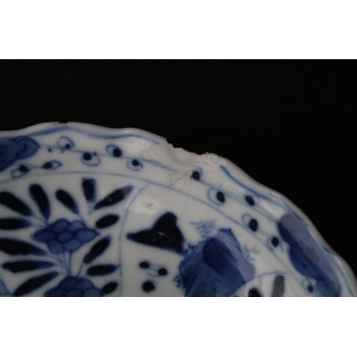 204A - Two Chinese blue and white pieces to include a round dish hand painted with florals and mountain sce... 