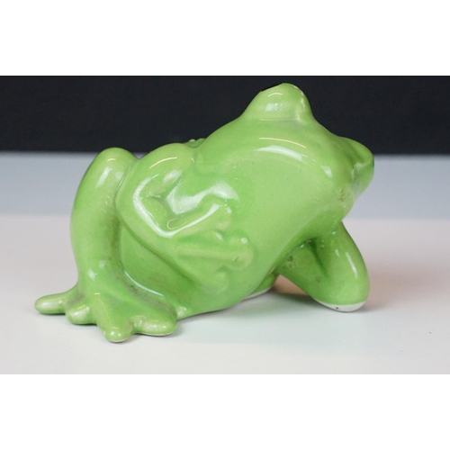 92 - Mixed collection of ceramic frogs to include a Poole pottery example together with three small metal... 