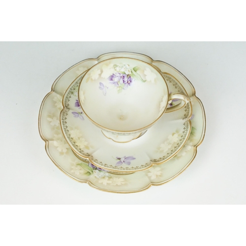 98 - R.S Poland China tea service set with lilac flowers and gilt detail comprising of three cups, four s... 