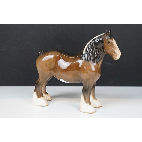 103A - Collection of ceramic figurines to include Beswick shire horses, three small horses, together with a... 