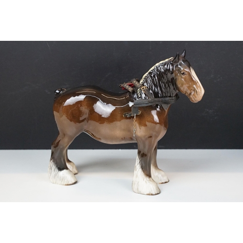 103A - Collection of ceramic figurines to include Beswick shire horses, three small horses, together with a... 