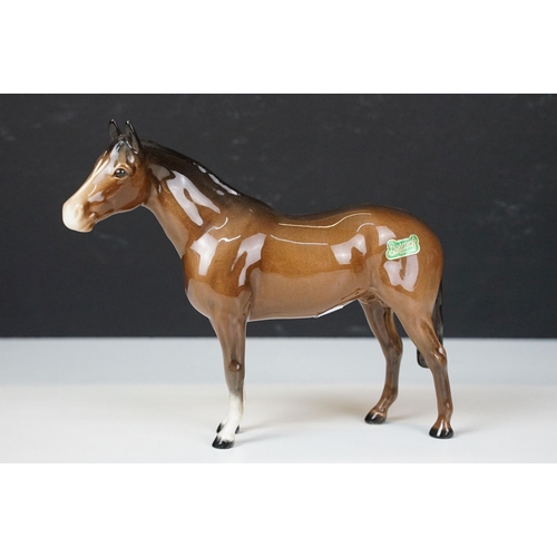 103A - Collection of ceramic figurines to include Beswick shire horses, three small horses, together with a... 