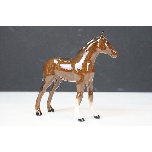 103A - Collection of ceramic figurines to include Beswick shire horses, three small horses, together with a... 