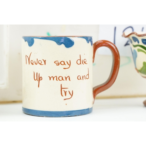 106 - Large assortment of Motto ware, Torquay and Devon ware, to include jugs, vases, plates, mugs, candle... 