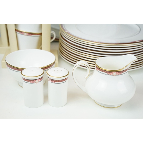 86 - Large collection of Royal Doulton Paragon for Debenhams Delphi dinner set to include nine cups, nine... 