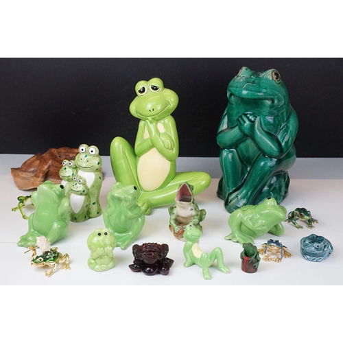 92 - Mixed collection of ceramic frogs to include a Poole pottery example together with three small metal... 