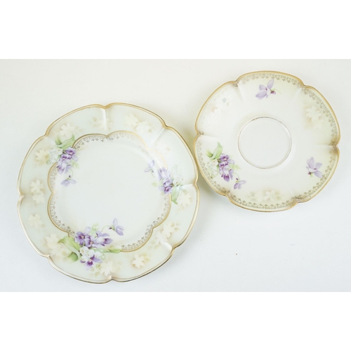 98 - R.S Poland China tea service set with lilac flowers and gilt detail comprising of three cups, four s... 