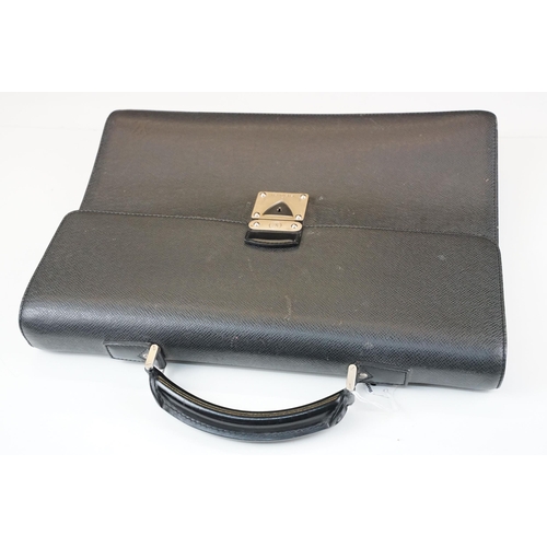 278 - Louis Vuitton black leather Robusto briefcase, flap closure with latch, handle to top, lined in canv... 