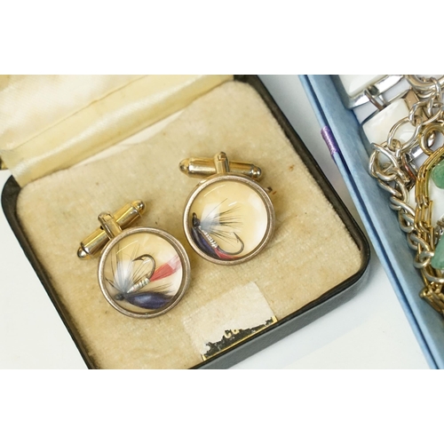 285 - A large collection of vintage and contemporary costume jewellery contained within jewellery boxes an... 