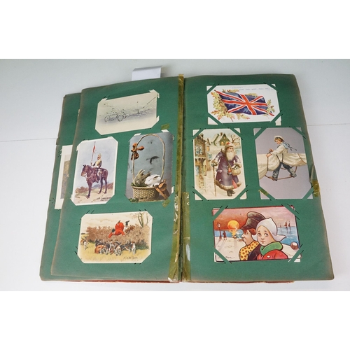 290 - An early 20th century postcard album with contents to include a good selection of real photo and pri... 