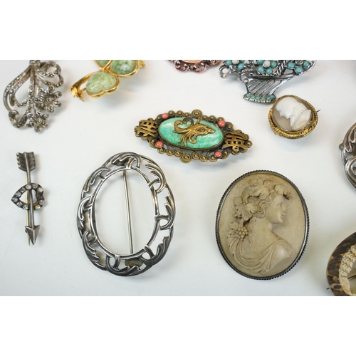 295 - A collection of antique and vintage brooches to include silver examples and a Scottish white metal a... 