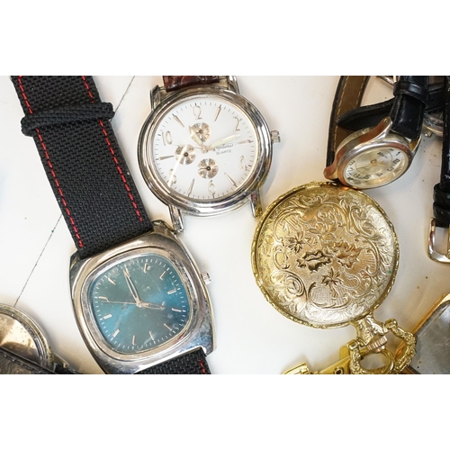 302 - A large collection of mixed wristwatches contained within a large porcelain bowl.