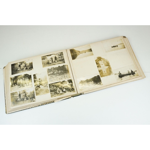 310 - Early 20th century black leather album containing approximately 250 black and white photographs and ... 