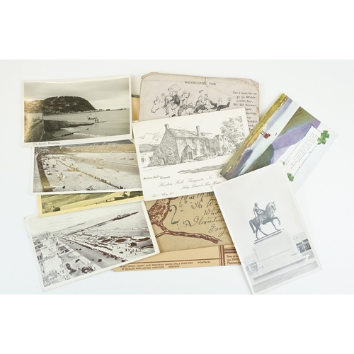 312 - A collection of mainly early 20th century printed and real photo postcards to include topographical ... 