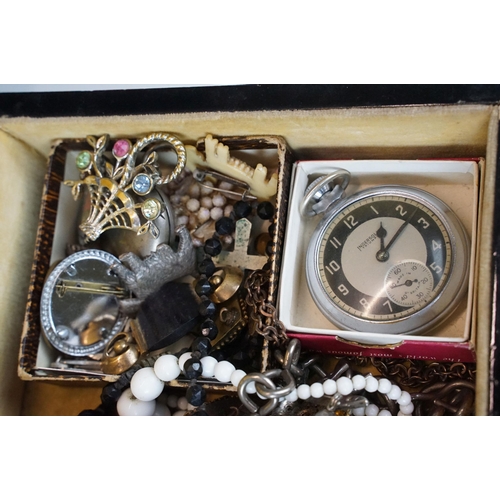 313 - A collection of vintage costume jewellery to include 9ct gold and sterling silver brooches, sovereig... 