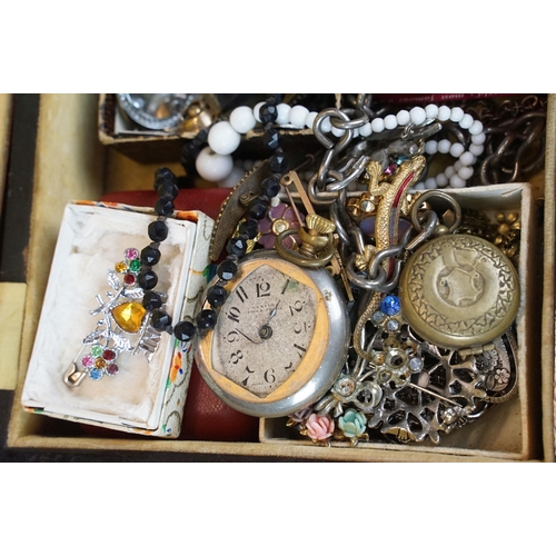 313 - A collection of vintage costume jewellery to include 9ct gold and sterling silver brooches, sovereig... 