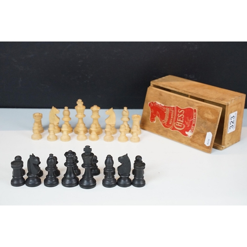 323 - A Staunton boxwood chess set within original wooden storage box.