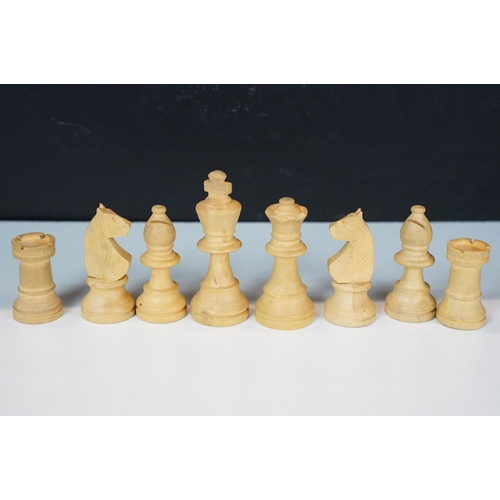 323 - A Staunton boxwood chess set within original wooden storage box.