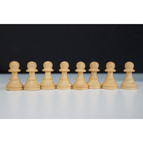 323 - A Staunton boxwood chess set within original wooden storage box.