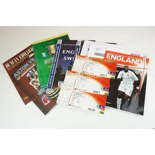 366 - A collection of football programmes to include a good selection of 2000's England international exam... 